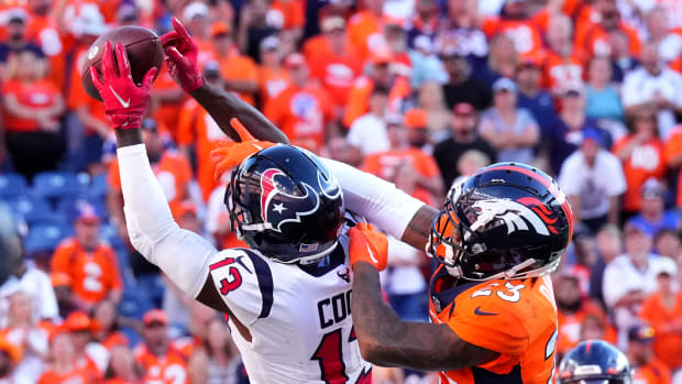 Houston Texans receiver Brandin Cooks (13) attempting to make a catch against the Denver Broncos.